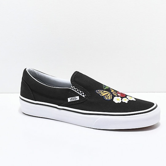 black floral checkerboard vans